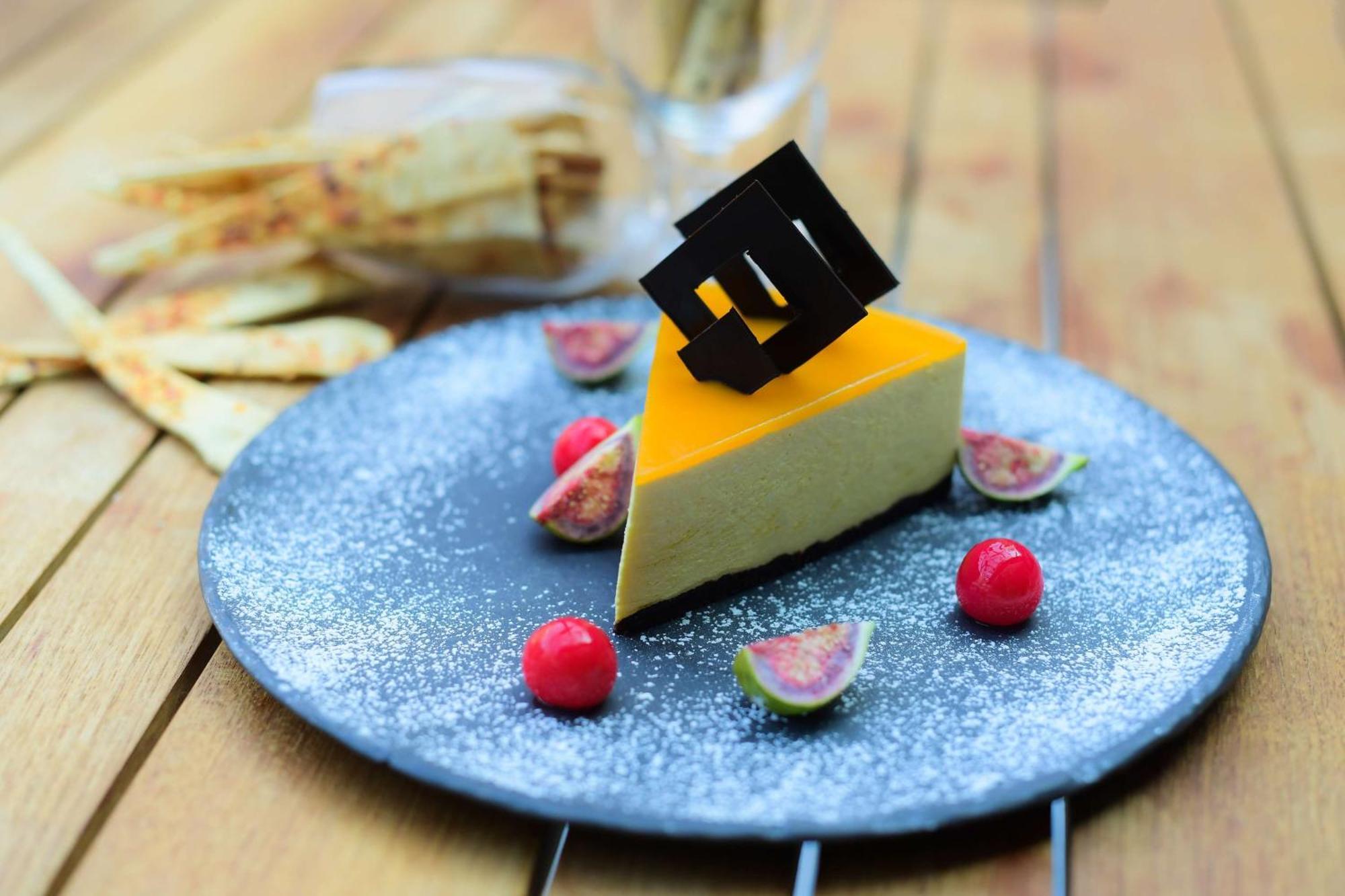 Radisson Blu Hotel Gauháti Kültér fotó A slice of mango cheesecake